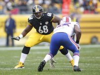 Charles LeClaire: Nov 10, 2013; Pittsburgh, PA, USA; Pittsburgh Steelers tackle Kelvin Beachum (68) prepares to block against Buffalo Bills outside linebacker Jerry Hughes (right) during the second quarter at Heinz Field. The Steelers won 23-10. Mandatory Credit: Charles L