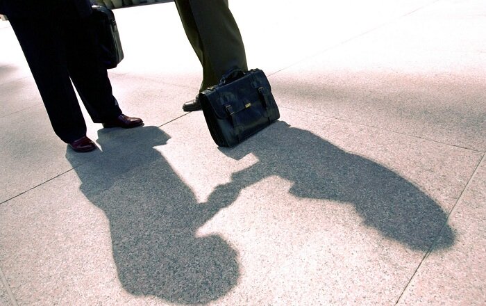 Shadow of Businessmen Talking bxp34508h Shadow of Businessmen Talking bxp34508h