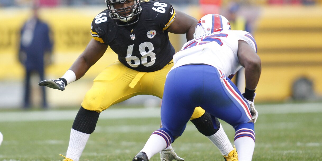 Nov 10, 2013; Pittsburgh, PA, USA; Pittsburgh Steelers tackle Kelvin Beachum (68) prepares to block against Buffalo Bills outside linebacker Jerry Hughes (right) during the second quarter at