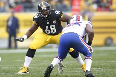 Nov 10, 2013; Pittsburgh, PA, USA; Pittsburgh Steelers tackle Kelvin Beachum (68) prepares to block against Buffalo Bills outside linebacker Jerry Hughes (right) during the second quarter at
