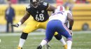 Charles LeClaire: Nov 10, 2013; Pittsburgh, PA, USA; Pittsburgh Steelers tackle Kelvin Beachum (68) prepares to block against Buffalo Bills outside linebacker Jerry Hughes (right) during the second quarter at Heinz Field. The Steelers won 23-10. Mandatory Credit: Charles L