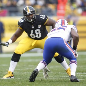 Charles LeClaire: Nov 10, 2013; Pittsburgh, PA, USA; Pittsburgh Steelers tackle Kelvin Beachum (68) prepares to block against Buffalo Bills outside linebacker Jerry Hughes (right) during the second quarter at Heinz Field. The Steelers won 23-10. Mandatory Credit: Charles L